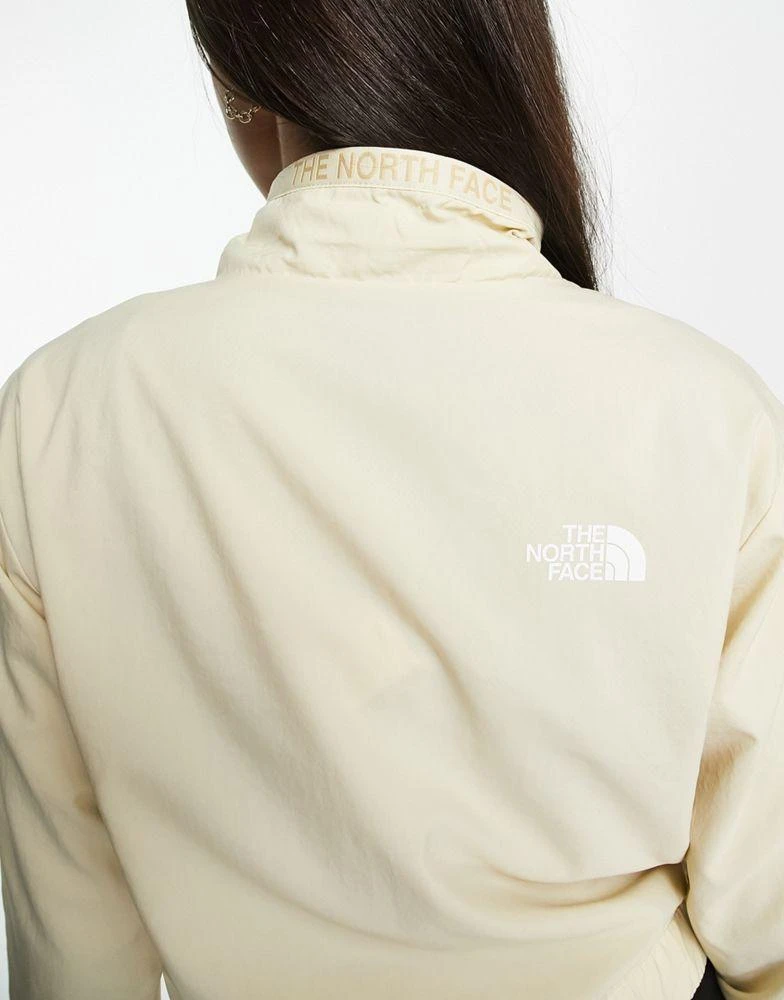 The North Face The North Face Zumu overhead track jacket in stone 3