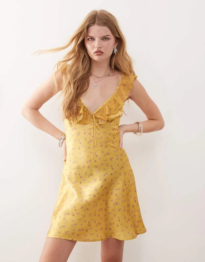 Reclaimed Vintage Reclaimed Vintage mini tea dress with flutter sleeves in yellow floral print