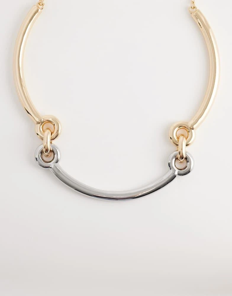 ASOS ASOS DESIGN torque necklace with loop detailing in silver tone