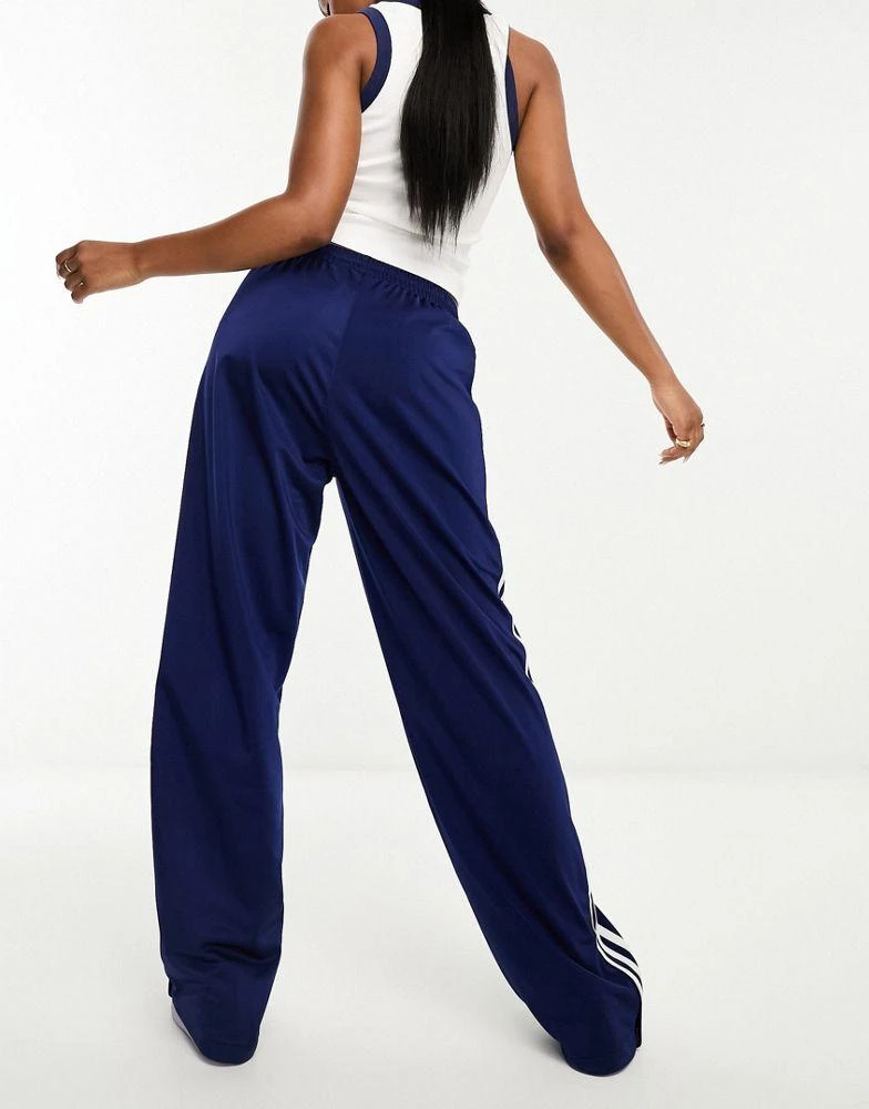 Adidas adidas Originals Firebird Loose track pants in navy 4