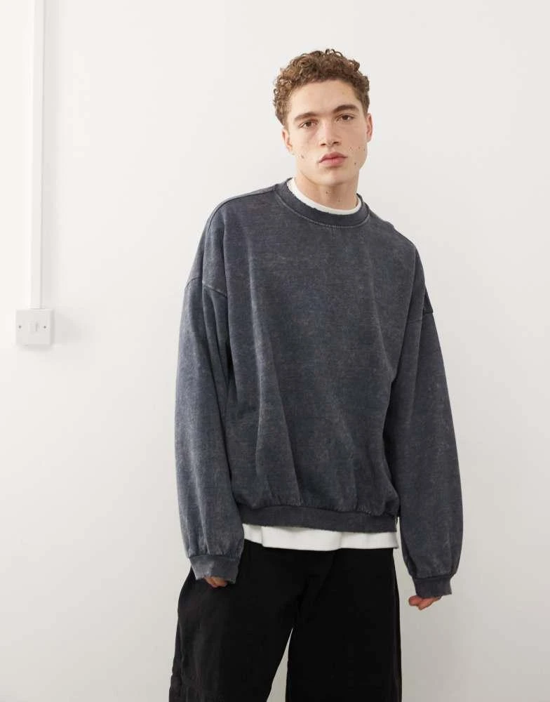 Weekday Weekday Leon oversized sweatshirt in black acid wash 1