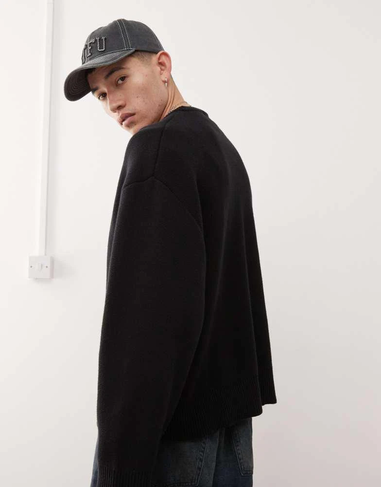 Weekday Weekday Cypher oversized jumper with red jacquard graphic in black 4