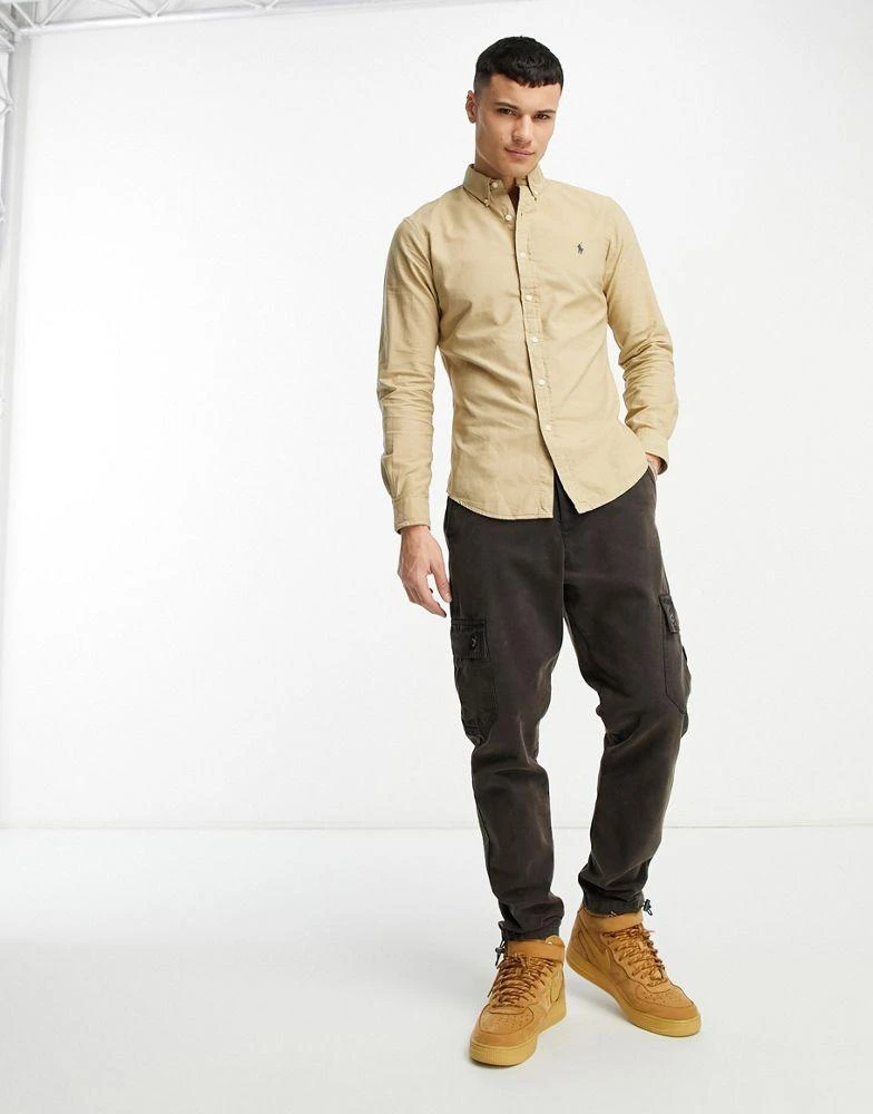 Ralph Lauren Polo Ralph Lauren icon logo slim fit garment dyed oxford shirt in tan 3