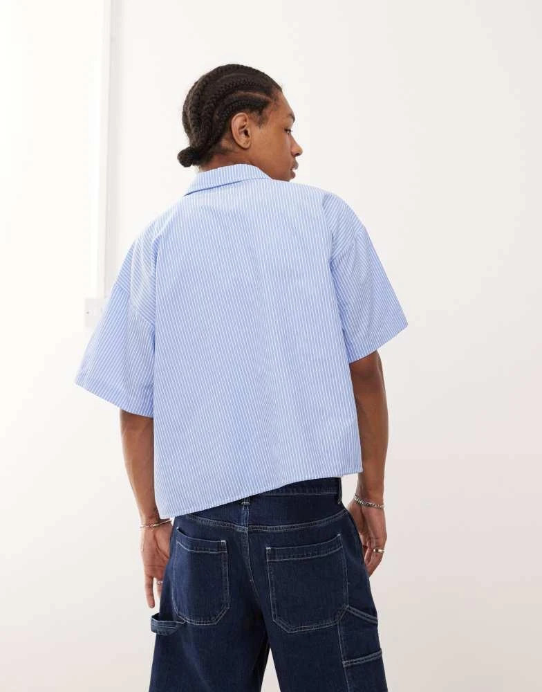 Reclaimed Vintage Reclaimed Vintage short sleeve boxy shirt in blue pinstripe 4