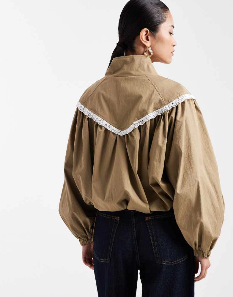 Miss Selfridge Miss Selfridge lace trim funnel neck track jacket in khaki 4