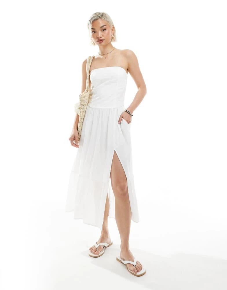 Shop Hollister strapless drop waist textured midi dress with a