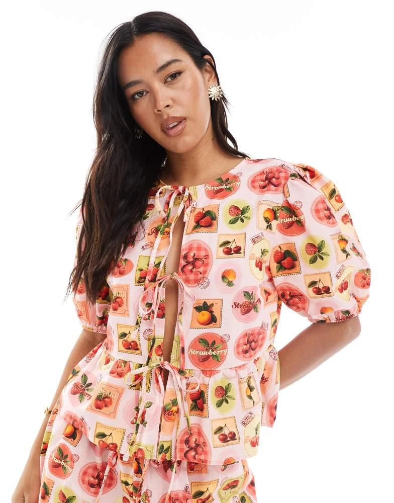 Miss Selfridge Miss Selfridge tie front peplum blouse co-ord in fruit print 1