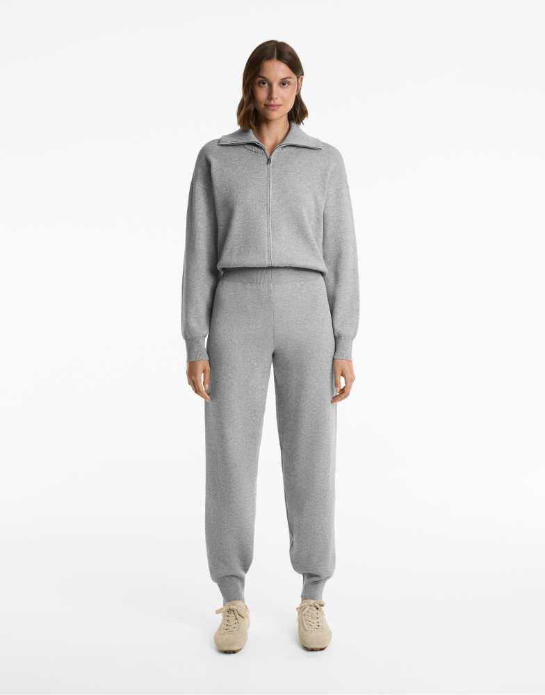 OYSHO OYSHO Half-zip long knit jumpsuit in black