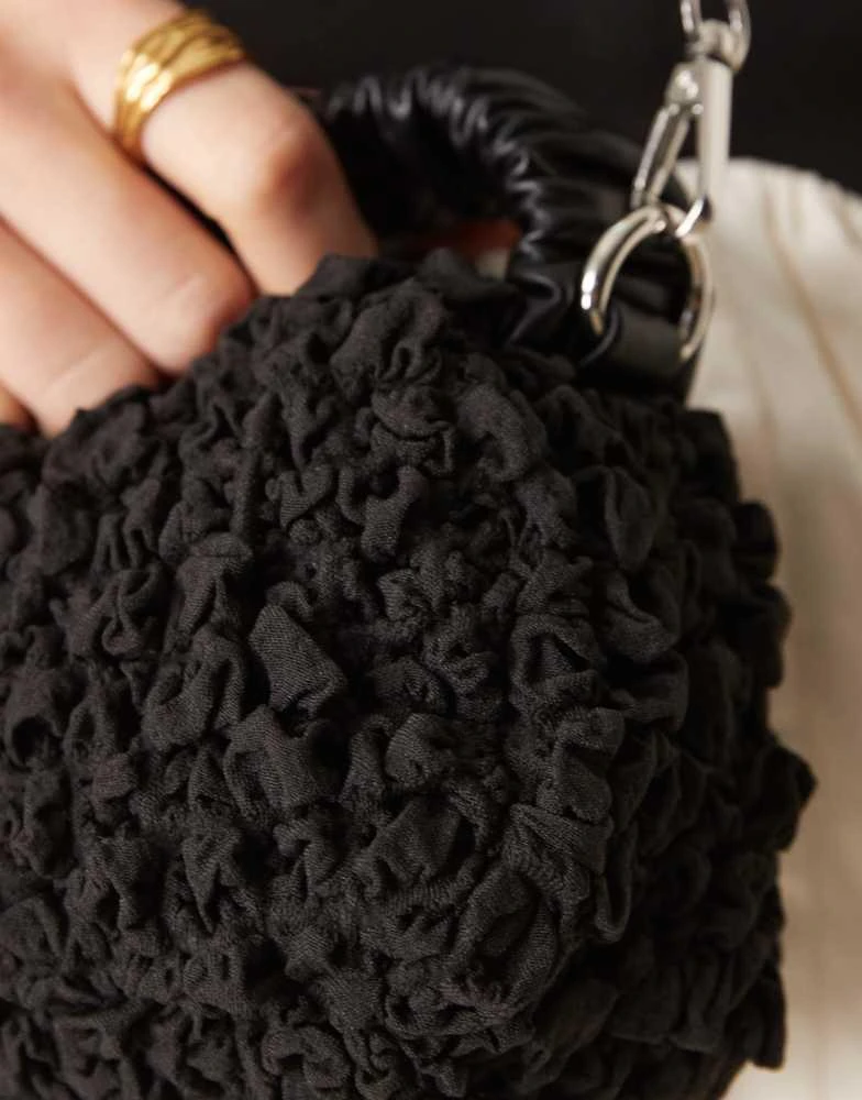 ASOS ASOS DESIGN ruched handle textured grab bag with detachable chain crossbody strap in black 4