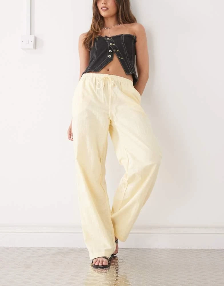 Motel Motel wasic wide leg relaxed linen trouser in lemon yellow 1