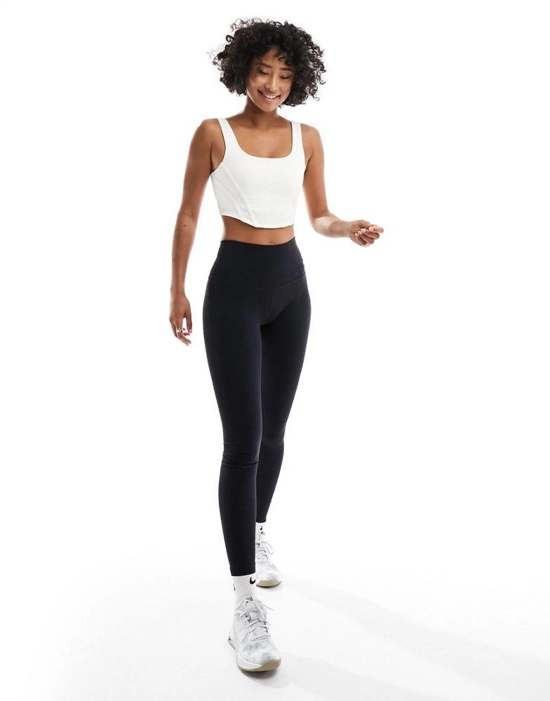 NIKE Nike Training swoosh corset light support sports bra in white - WHITE 2