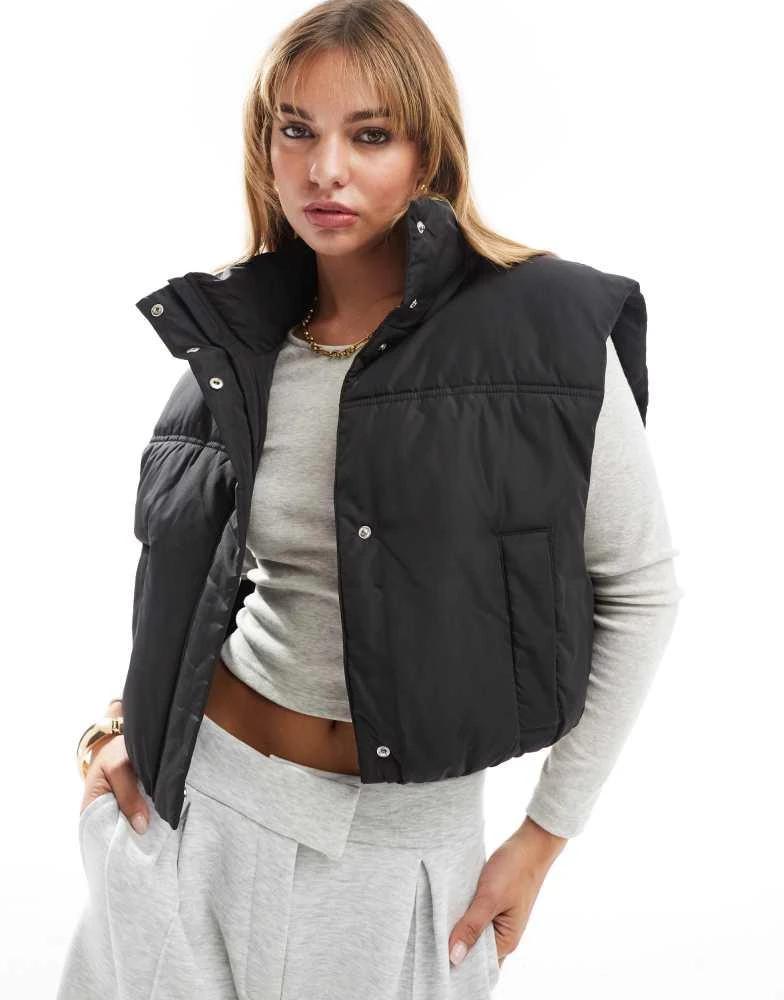 ASOS ASOS DESIGN funnel neck puffer gilet in black 4