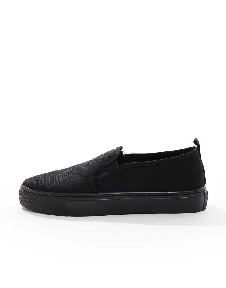 ASOS ASOS DESIGN Wide Fit Dotty slip on plimsolls in black