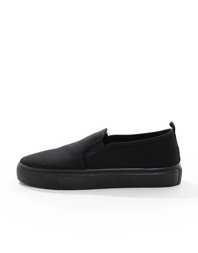 ASOS ASOS DESIGN Wide Fit Dotty slip on plimsolls in black 2
