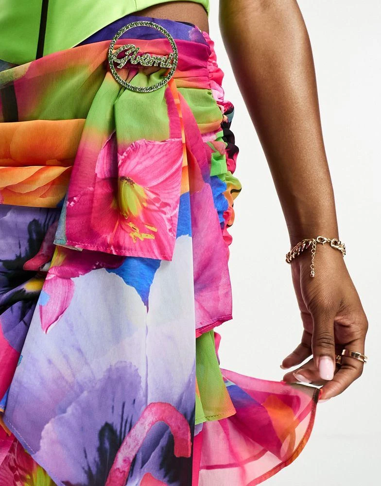 Gbemi Gbemi Sanna ruched ruffle mini skirt with crystal logo drape detail in graphic floral 2