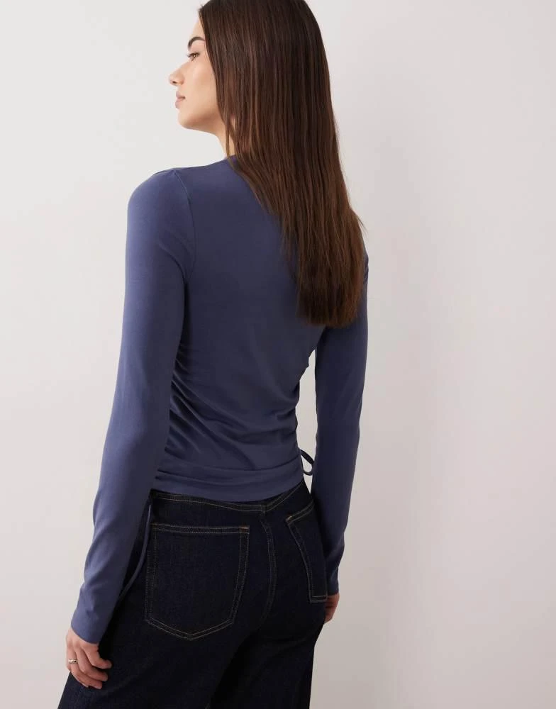 ASOS ASOS DESIGN ruched detail tie side high neck long sleeve top in navy 3