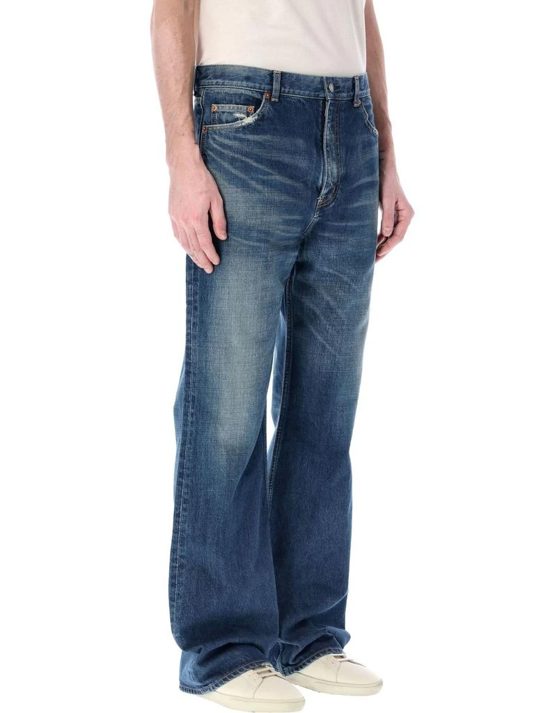 Yves Saint Laurent Saint Laurent Whiskering-Effect Distressed Bootcut Jeans 3