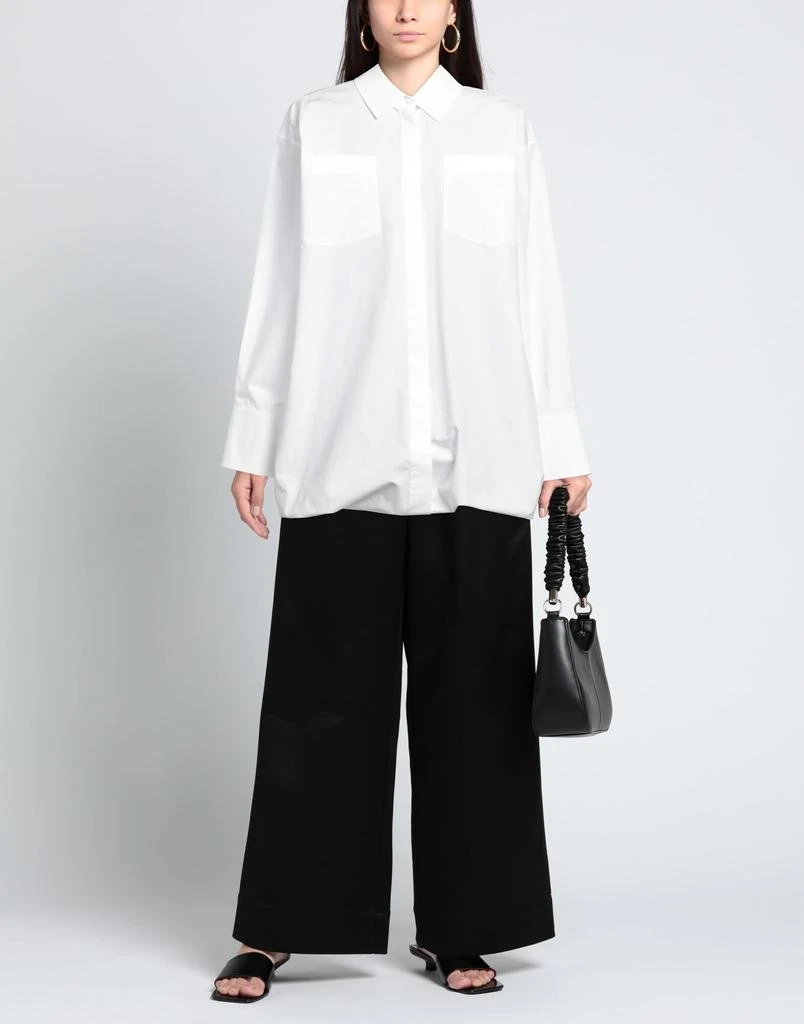 Valentino Solid color shirts
blouses 2