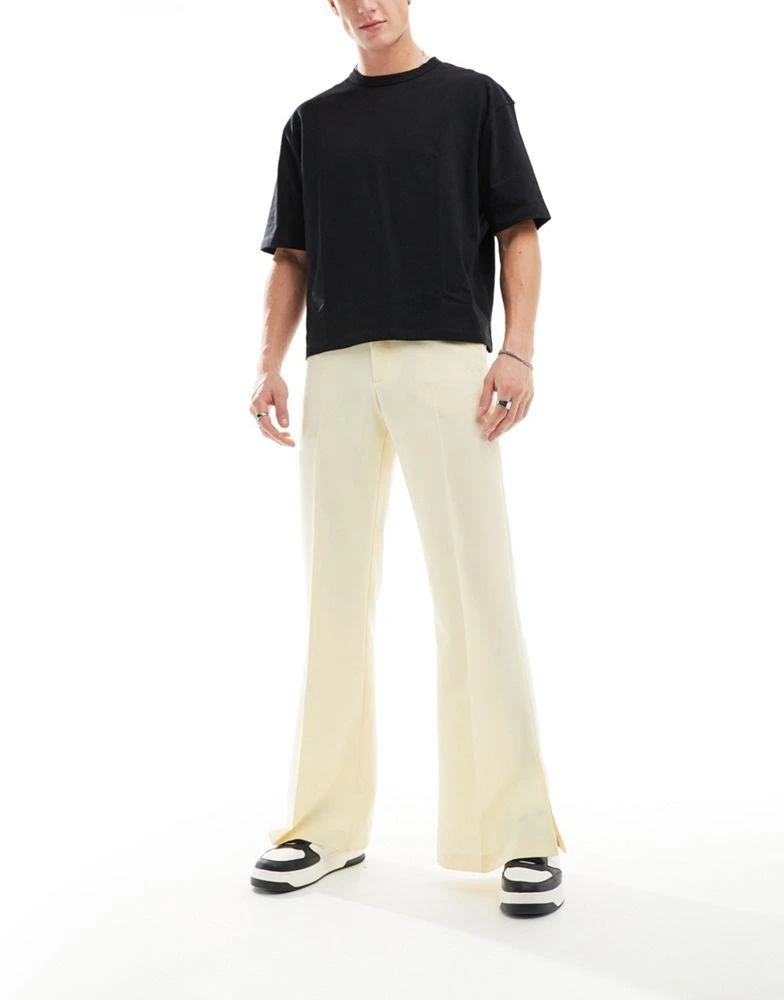 ASOS ASOS DESIGN smart vintage flare trousers with side split in yellow 3