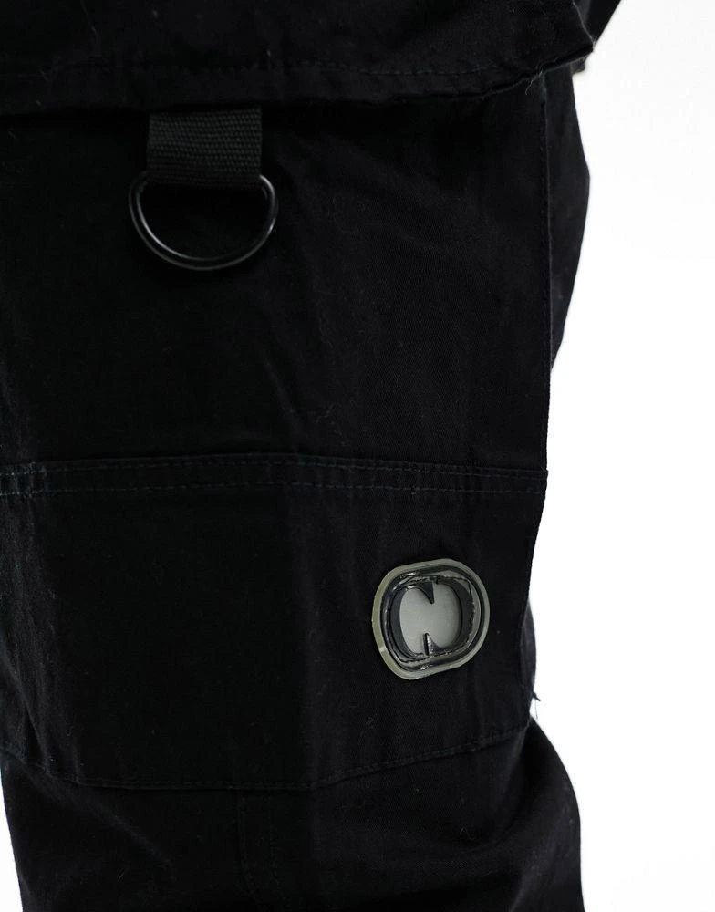 Criminal Damage Criminal Damage cuffed leg cargo pants with side leg army pockets in black 3