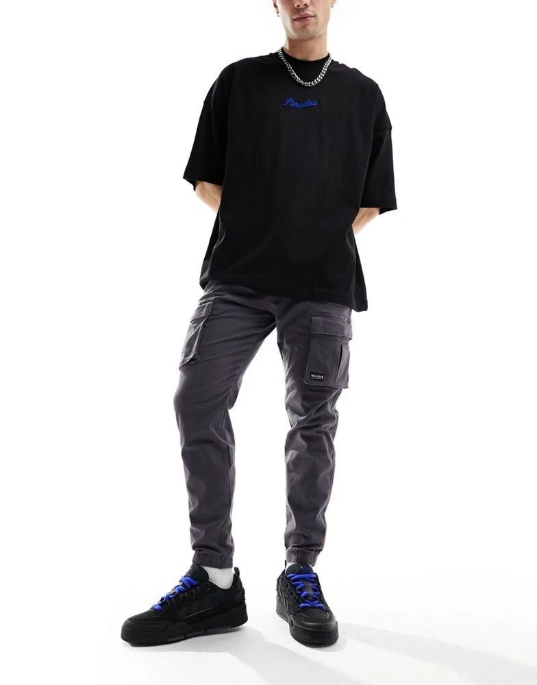 HOLLISTER Hollister front pocket skinny fit cargo joggers in dark grey 1