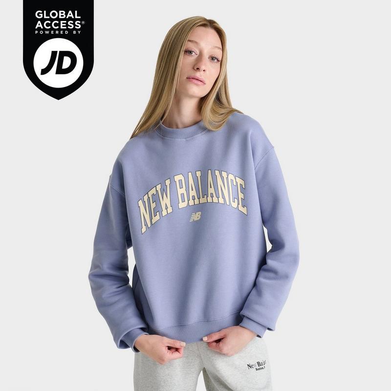 Shop Women's New Balance Collegiate Crewneck Sweatshirt on Shop Women's New Balance Collegiate Crewneck Sweatshirt on