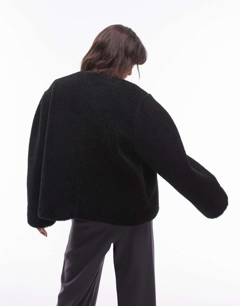 Topshop Topshop toggle short collarless borg coat in black