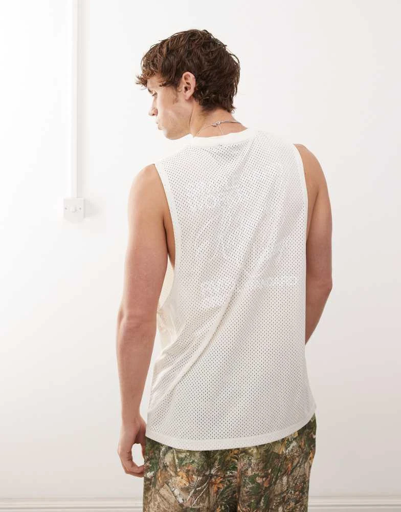 Reclaimed Vintage Reclaimed Vintage oversized dropped armhole airtex vest in white 4