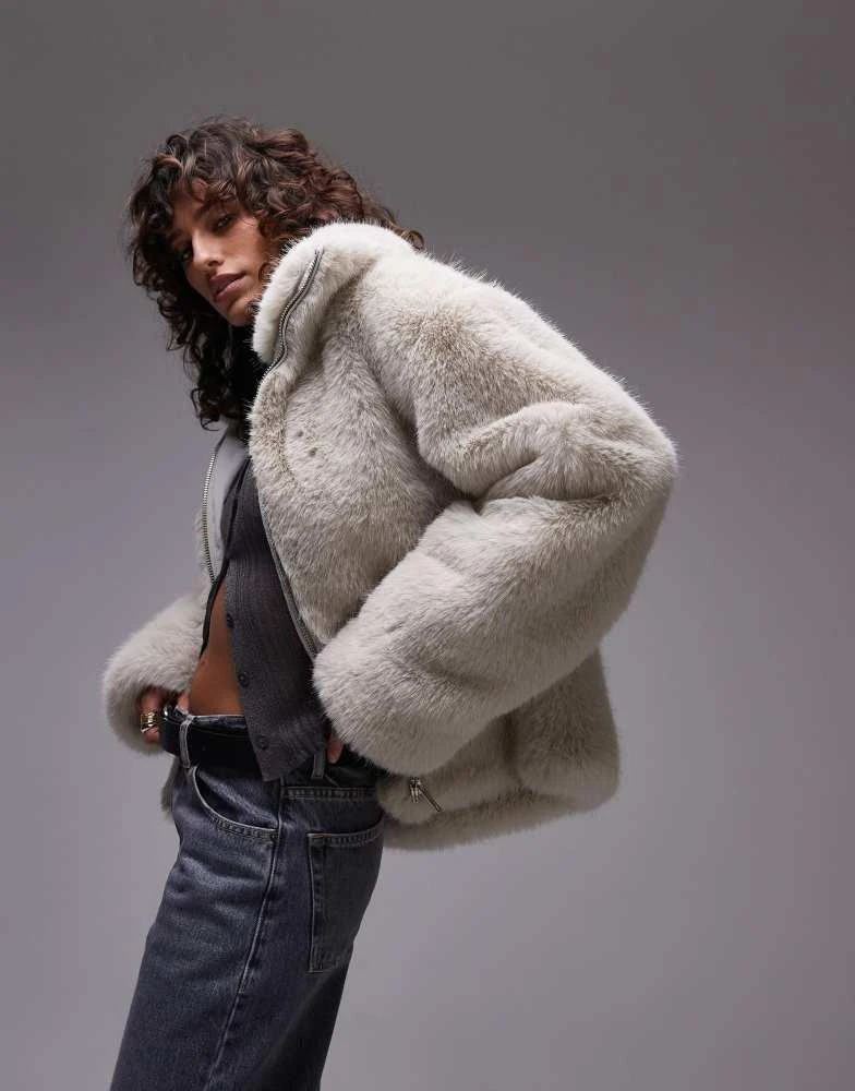 Topshop Topshop faux fur zip through short coat with funnel neck in tipped white 1