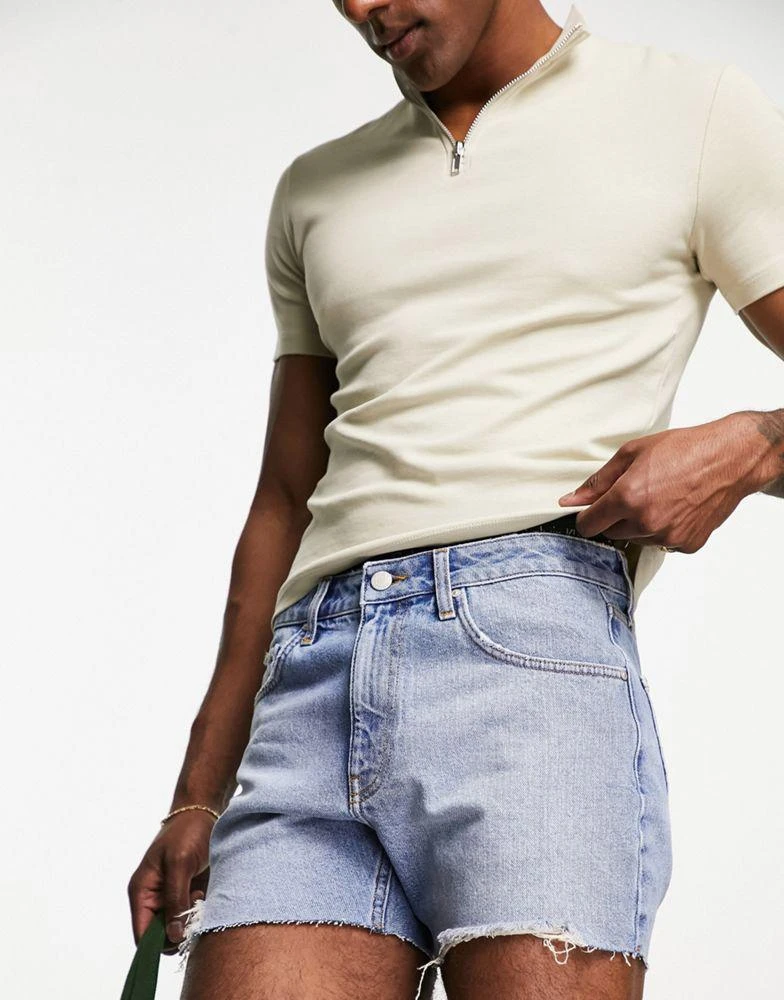 ASOS ASOS DESIGN slim shorter length ripped denim shorts in light blue wash 4