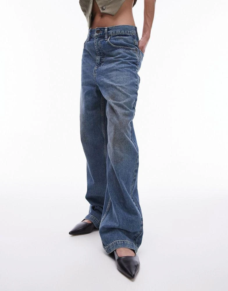 Topshop Topshop high rise Baggy jeans with mud marks in mid blue 1