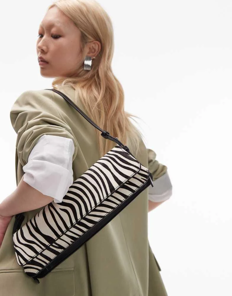 Topshop Topshop Stassi elongated shoulder bag in black PU with leather zebra print panels 1