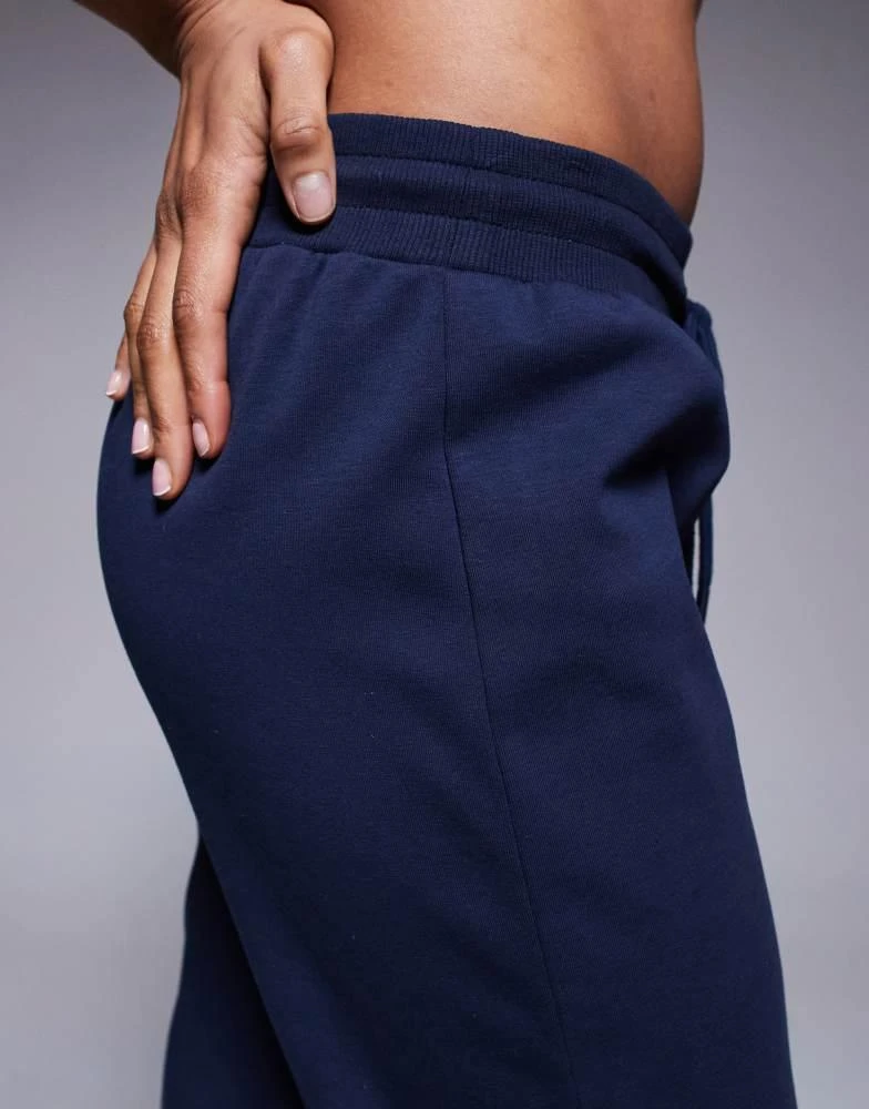 ASOS ASOS DESIGN Tall interlock flared jogger in navy 4