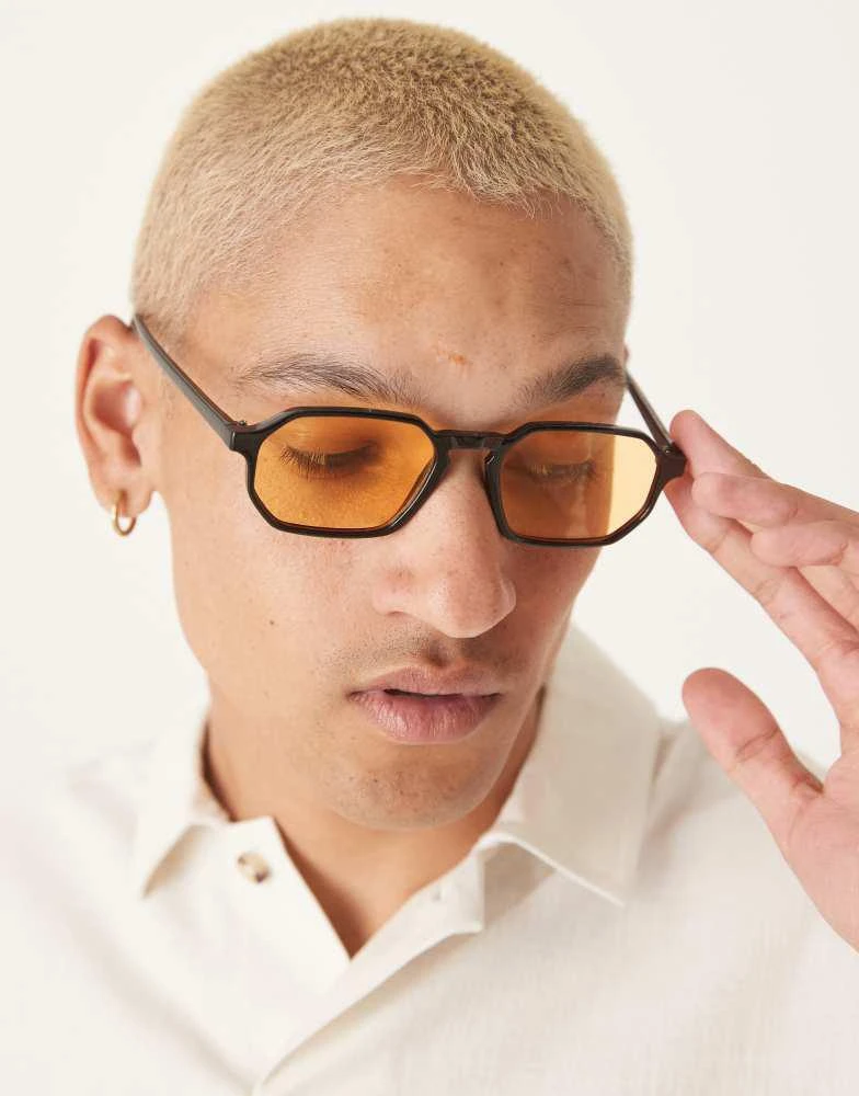 ASOS ASOS DESIGN round sunglasses with black frame and amber lens 1