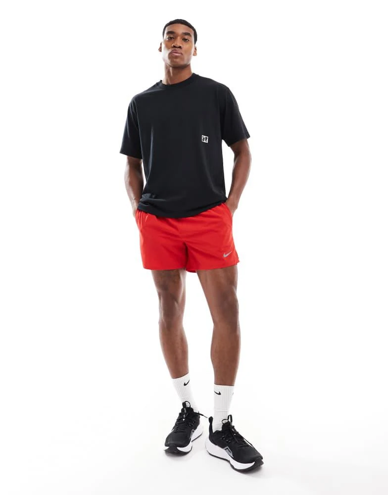 Shop Nike Running Challenger Dri-FIT inch in shorts in red