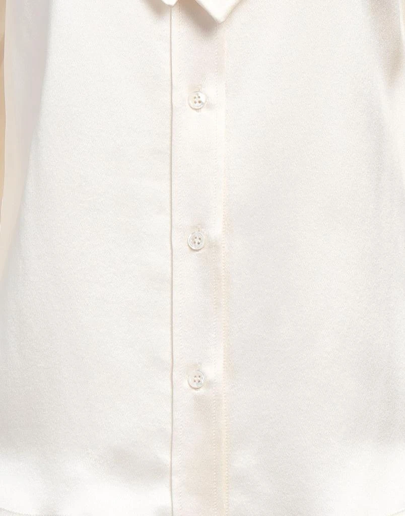 Yves Saint Laurent Solid color shirts 
blouses 4