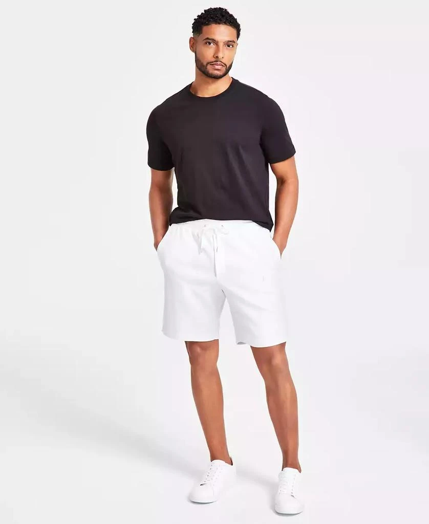 Michael Kors Men's Athletic-Fit Stretch Textured Logo 9" Shorts 1