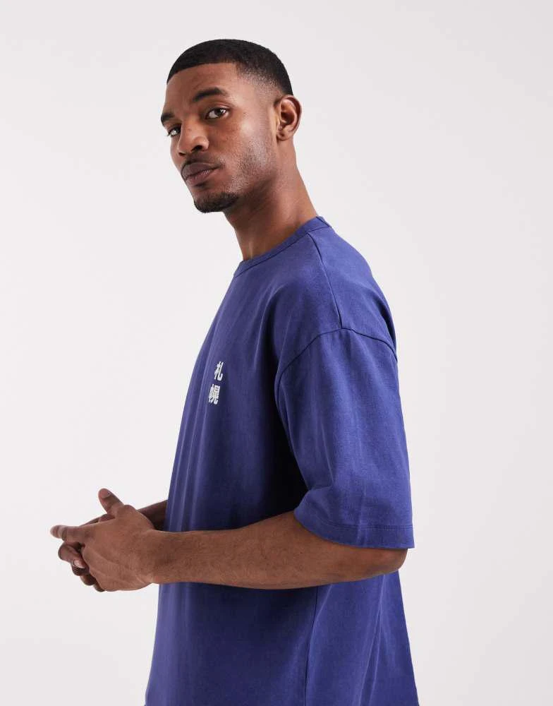 ASOS ASOS DESIGN heavyweight oversized t-shirt with text back graphic in dark blue wash 4