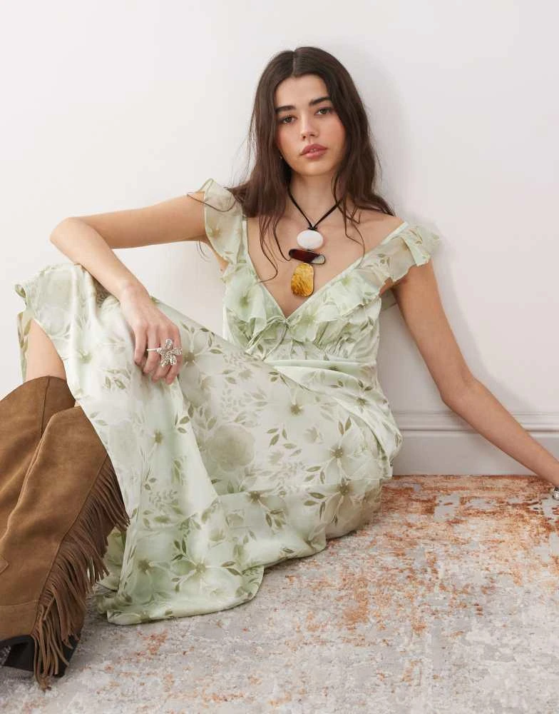Shop Reclaimed Vintage maxi cami tea dress with flutter sleeves in green  floral print on Sale at BeyondStyle  Get 10% Off Reclaimed Vintage maxi  cami tea dress with flutter sleeves in