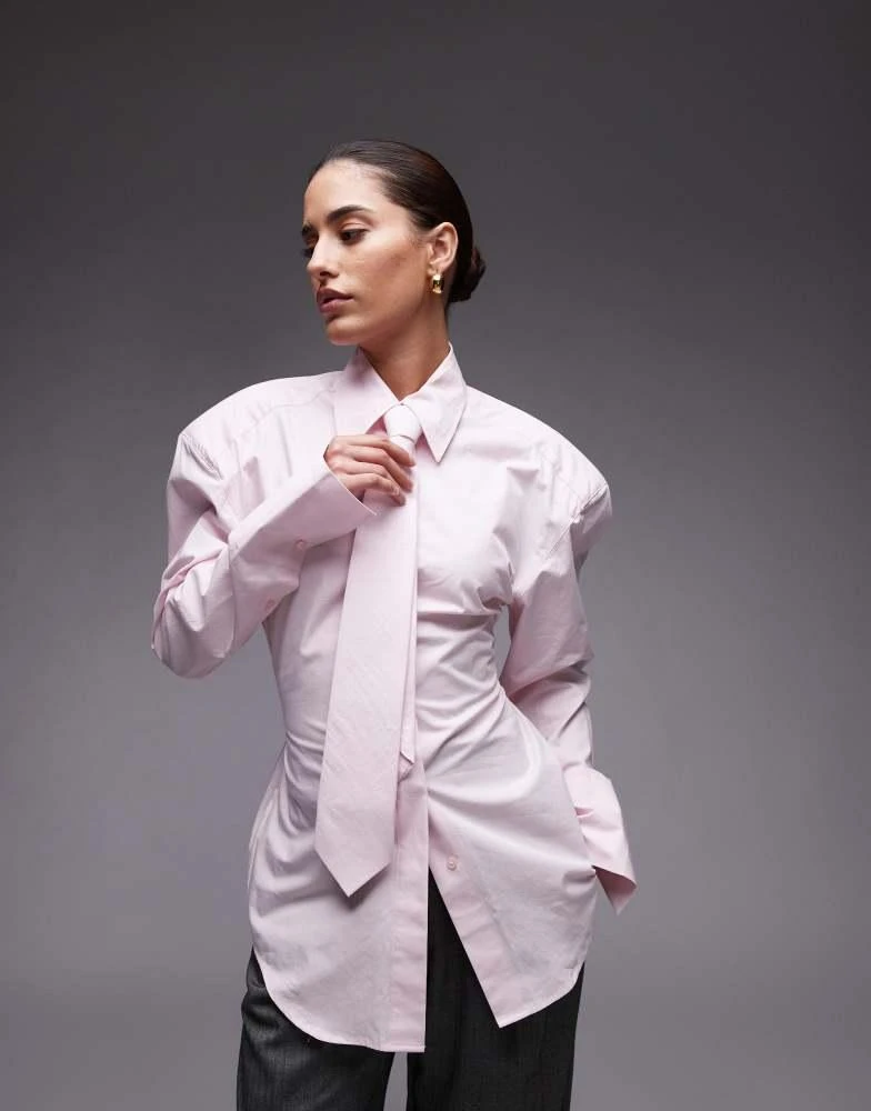 ASOS ASOS DESIGN cinch waist shirt with shoulder pads and tie in pink 1