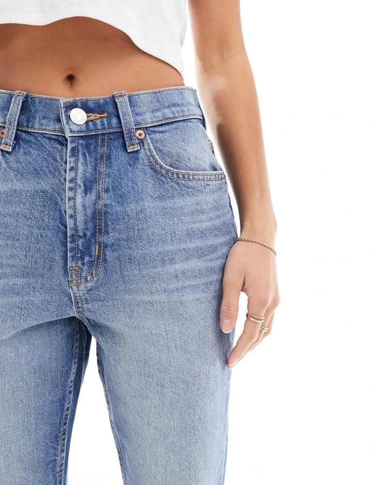 ASOS ASOS DESIGN Petite mid rise flare jeans in mid blue 3