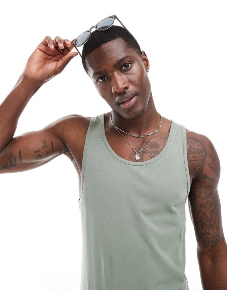 ASOS ASOS DESIGN essential muscle fit vest in mid green 1