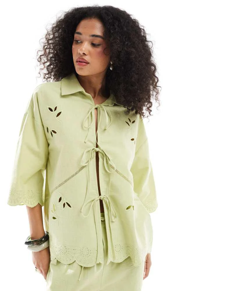 Native Youth Native Youth scallop edge tie detail blouse in sage green 1