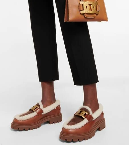 Tod's Kate leather and shearling loafers 4