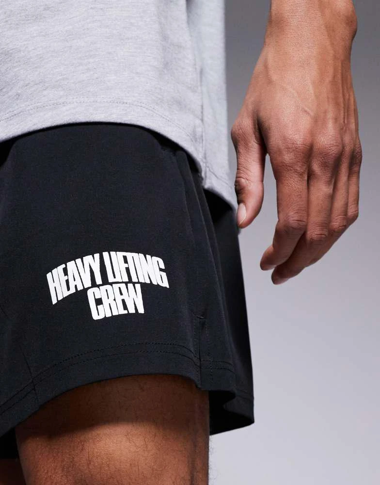 ASOS 4505 loose fit quick dry graphic training shorts with zip pockets in black 3