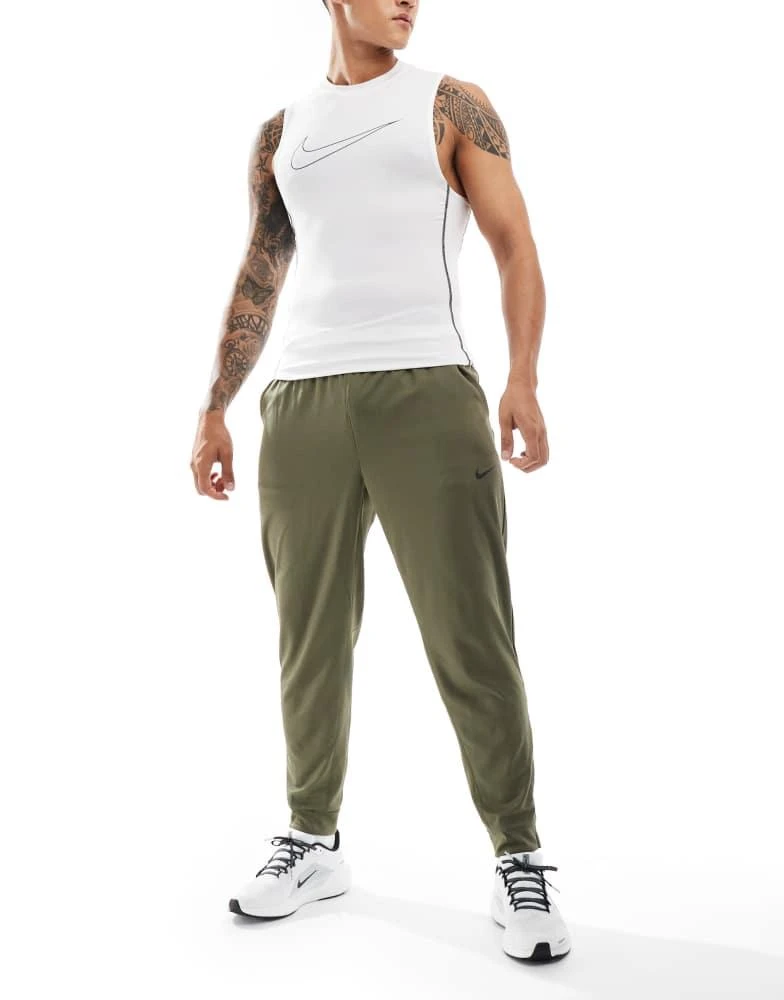 NIKE Nike Training Totality joggers in khaki 1