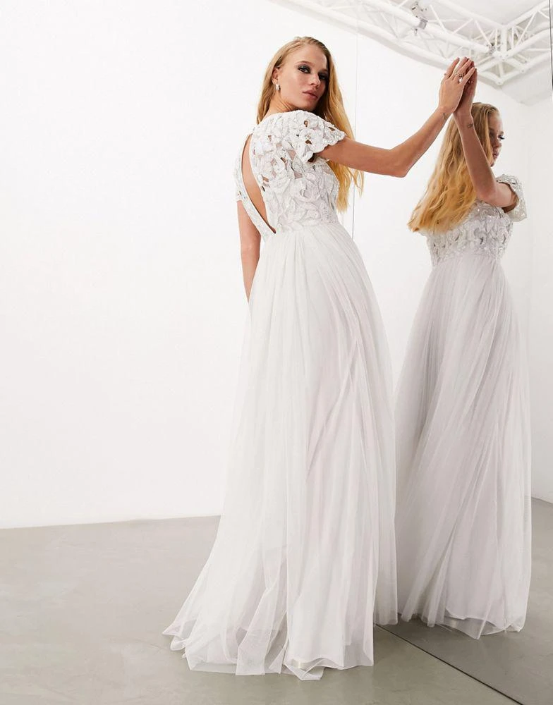 Shop ASOS DESIGN Isabelle sequin cutwork bodice maxi wedding dress with cap  sleeve in on Sale at BeyondStyle  Get 16% Off ASOS DESIGN Isabelle sequin  cutwork bodice maxi wedding dress with