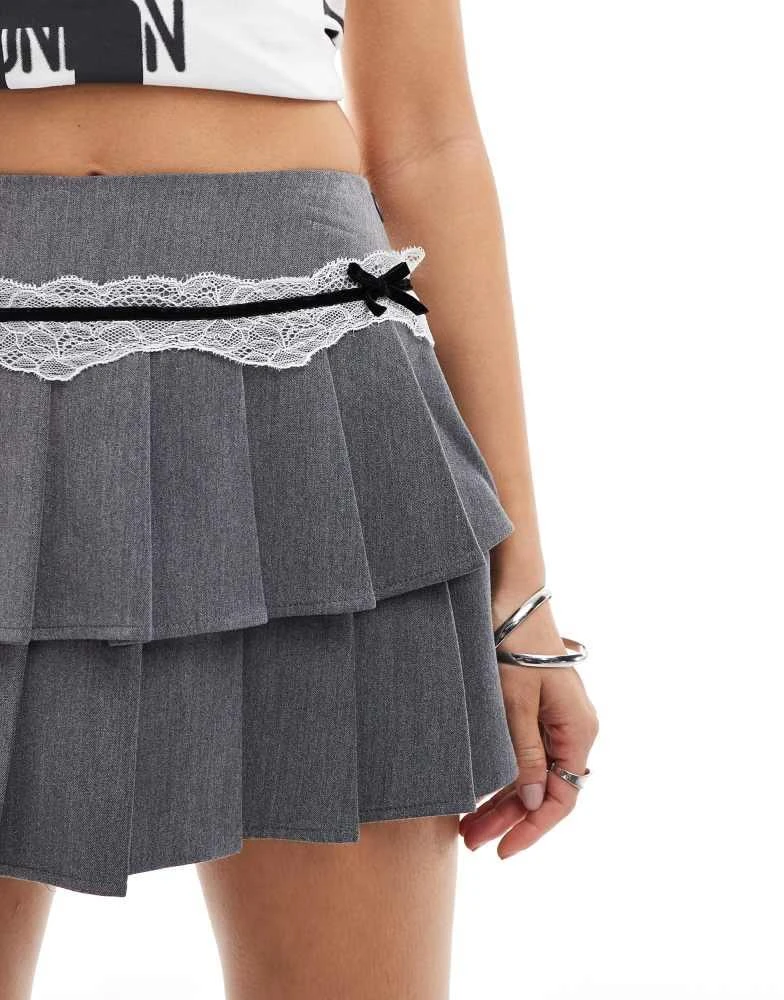 minga Minga London low rise pleated mini skirt with lace bow in grey 4