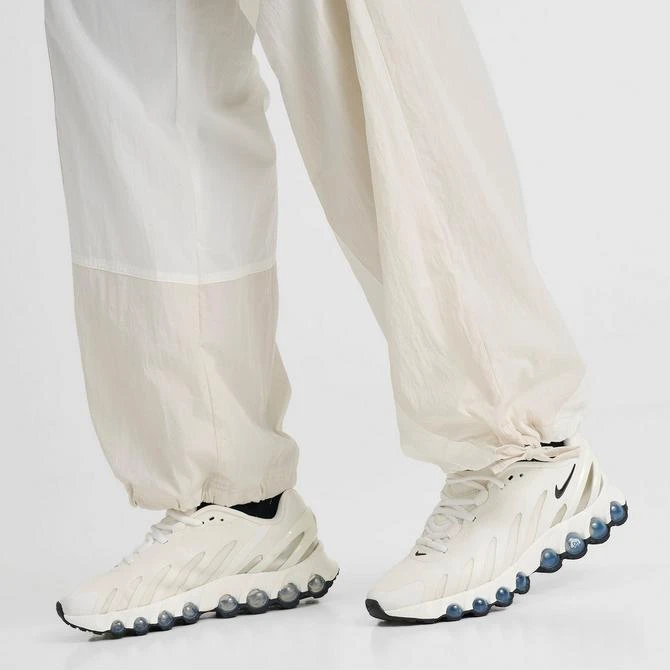 NIKE Women's Nike Sportswear Street Mid-Rise Loose Woven Open-Hem Pants 11