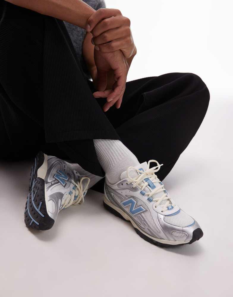 New Balance New Balance 204L unisex trainers in white and blue